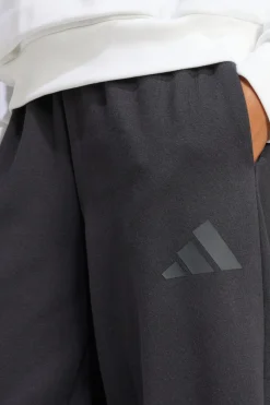 Calças Largas Em Fleece Essentials adidas