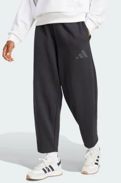 Calças Largas Em Fleece Essentials adidas