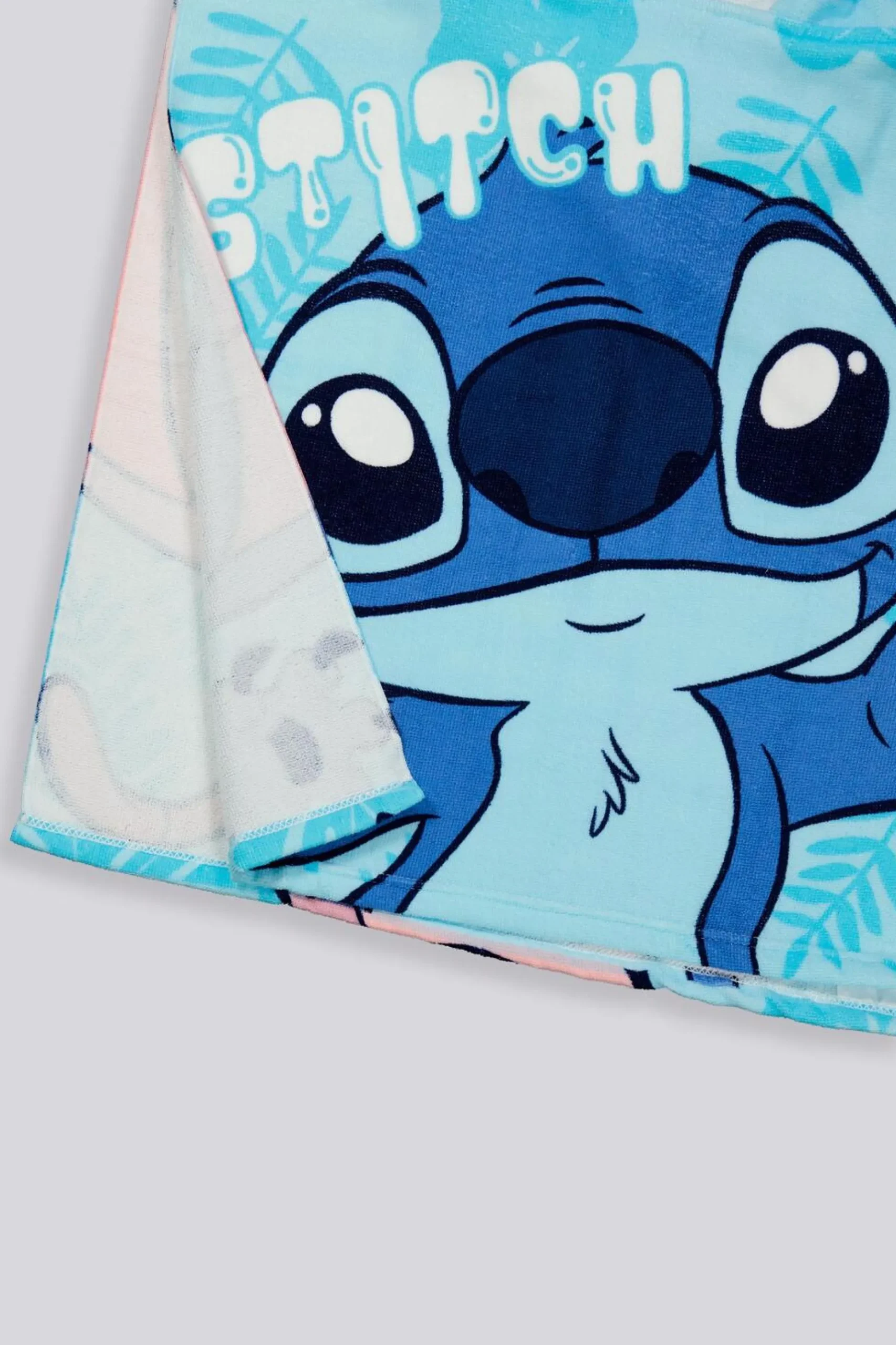 Toalha Poncho Stitch